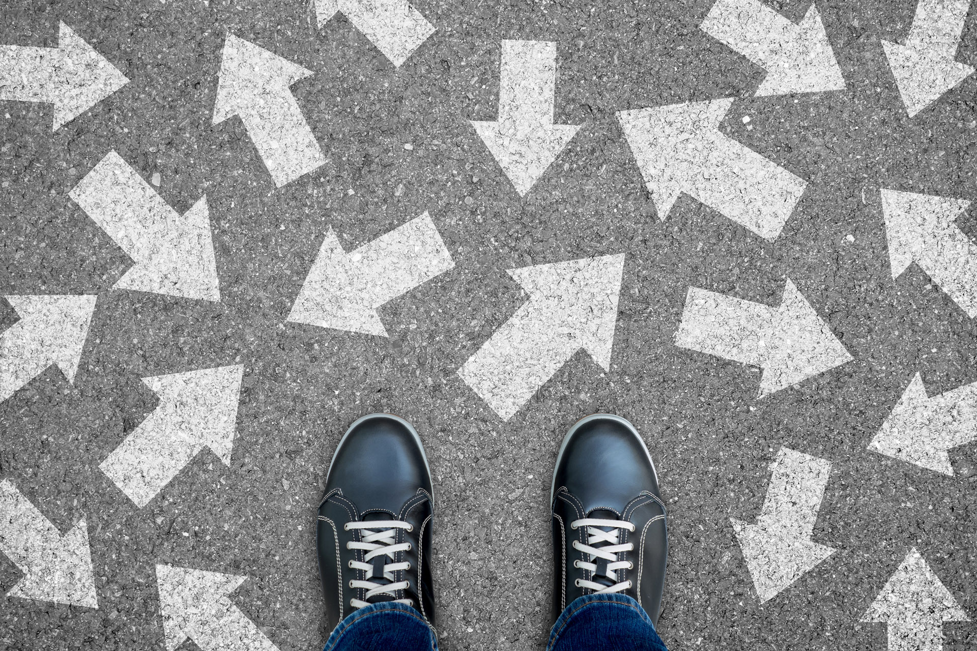 One standing on the road to future life with many direction sign point in different ways. Decision making is very hard to design.